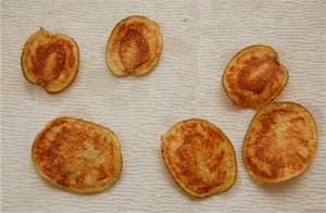 Figure 2. ZC symptoms from infected tubers after frying. Origin of the name of the disease comes from the striping — zebra chip.