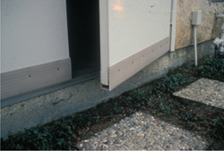 Figure 5. Metal flashing or a metal channel prevents rodents from gnawing at the bottom edge of a door. 