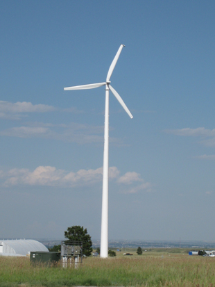 Figure 1. Small wind turbines come in many sizes from micro turbines like the 400 watt turbine above (a) to turbines as large as 50 to 100 kW like the 50 kW turbine pictured above (b). 