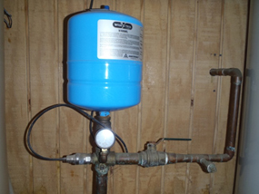 Figure 2. Small pressure tank associated with a VFD-controlled water pump. 