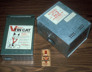 Figure 6. Victor Tin Cat® and Ketch-All® multiple-catch mouse traps with a mouse snap trap in the middle for comparison. 