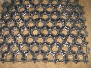 Figure 3. A honeycomb-shaped matting product can help with barn drainage problems. 