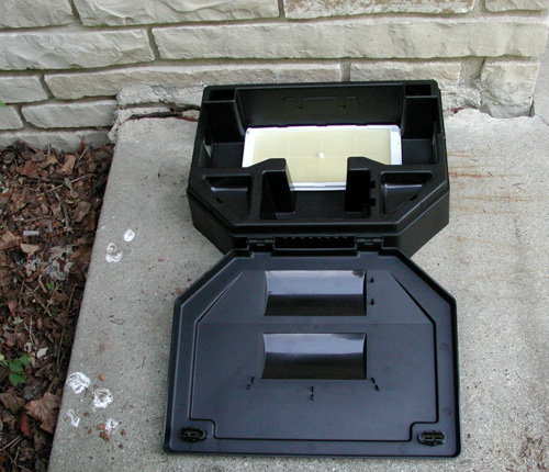 Figure 1. AEGIS™-RP Bait Station (Liphatech, Inc.) holding a glue board.