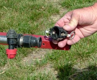 Figure 7. End cap on wet boom to drain and flush boom.