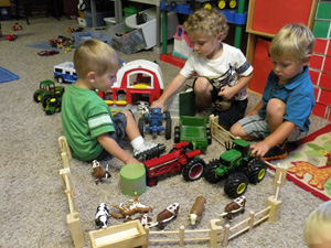 Figure 1. Three-, four-, and five-year-olds establish friendships and enjoy realistic play together. 